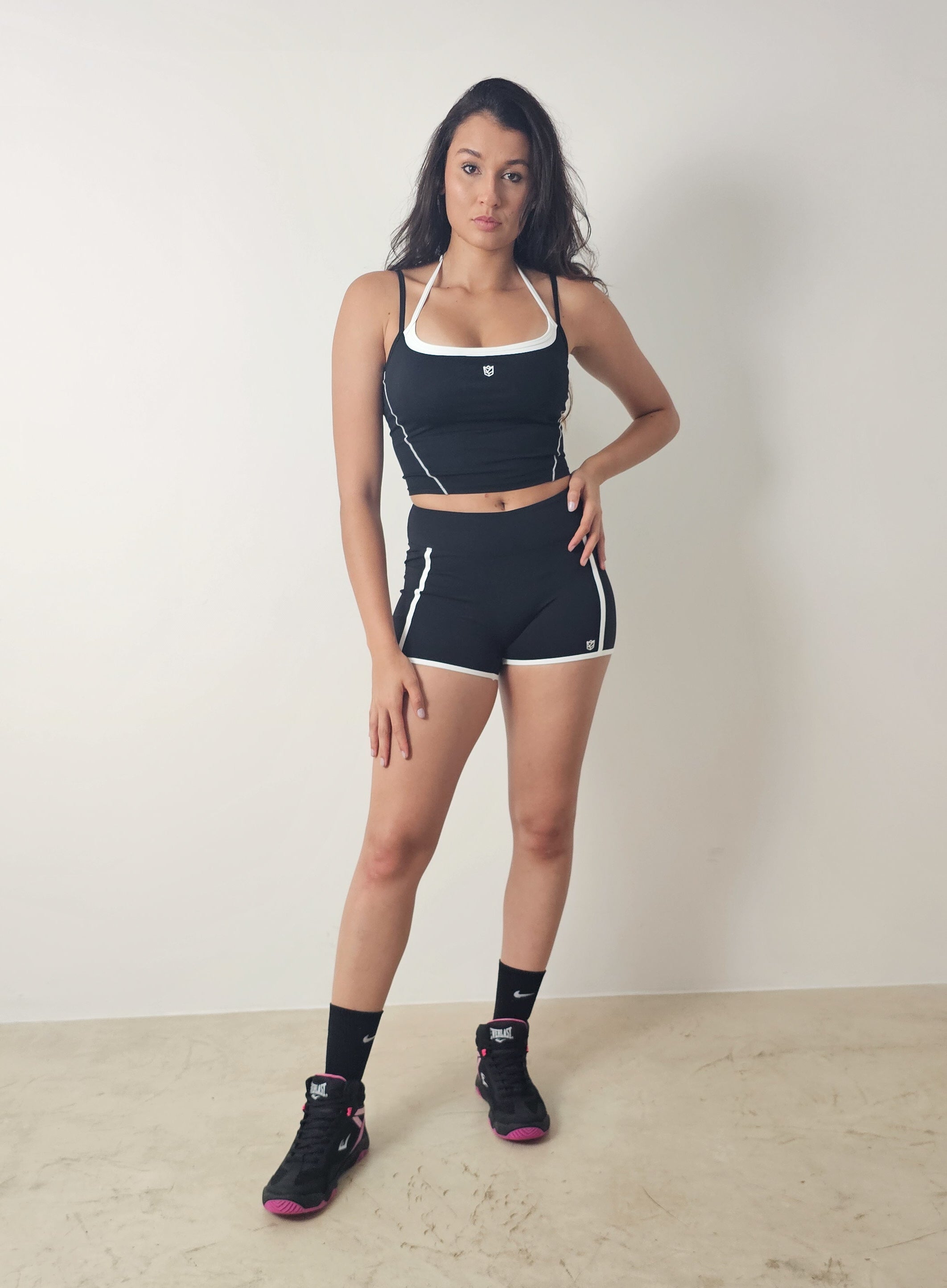 Black shorts with white stripes